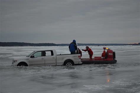 Man dies when transport vehicle crashes through ice on Minnesota lake
